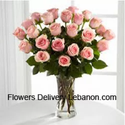 24 Pink Roses With Some Ferns In A Vase