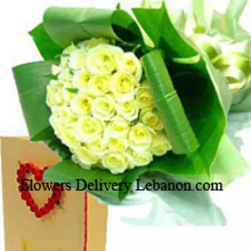 Ramo de 50 rosas amarillas con una tarjeta de felicitación gratuita