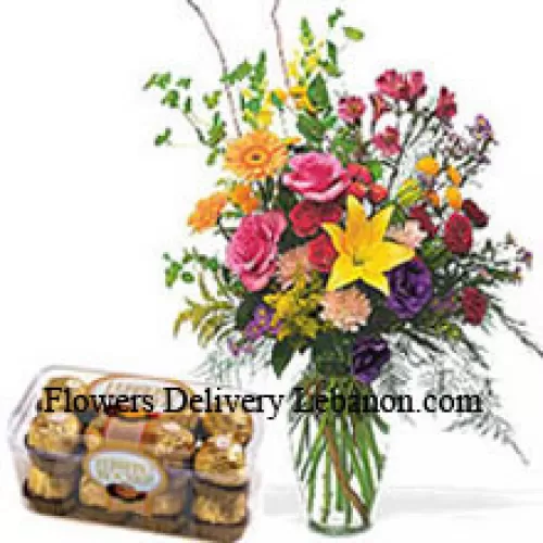 Raznovrsni cvjetovi u vazi s 16 komada Ferrero Rochera